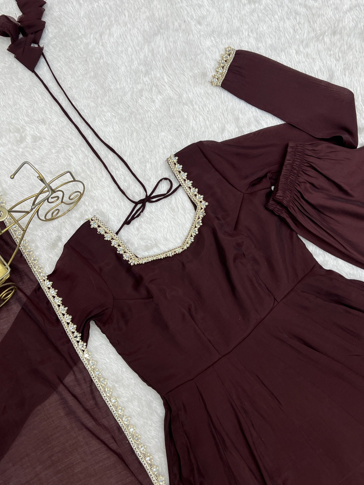Close-up of handwork and mirror work neckline on Dark Brown Anarkali suit